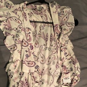 Top never worn, still has tags.